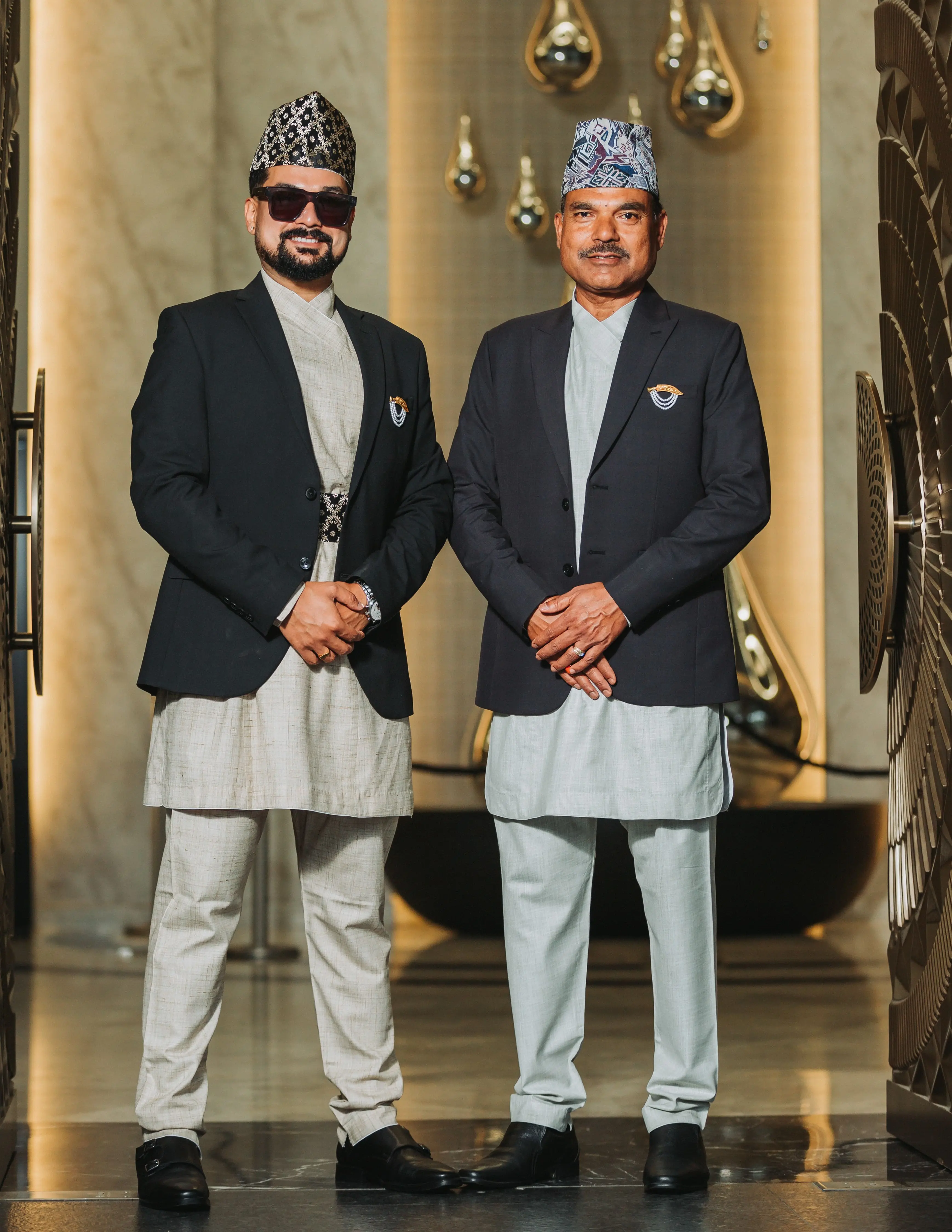 Two members of the Fresco Retreat family in traditional Nepali attire