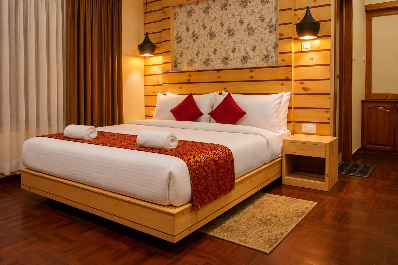 Fresco Club Suite bedroom with wooden interiors and warm pendant lighting